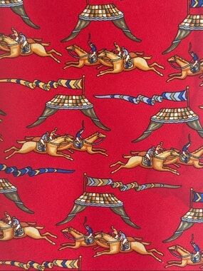Salvatore Ferragamo 100% silk necktie featuring an equestrian print